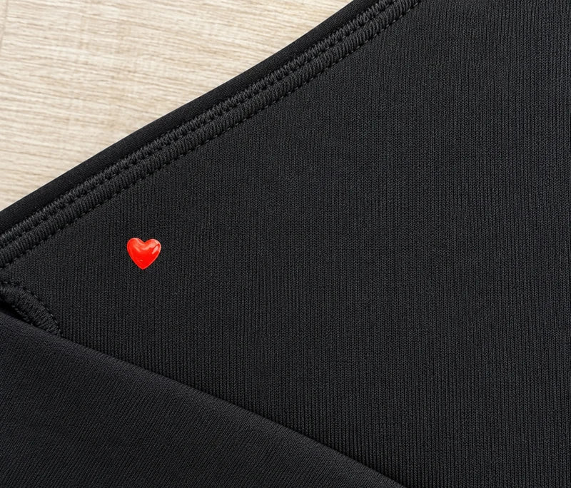 Design detail close-up — Lorna Jane Black Wrapped Nursing Bra – Size S.