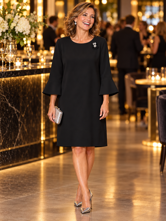 LIU JO Eden black bell sleeve shift dress IT 46 BNWT — front on model with jewelled brooch