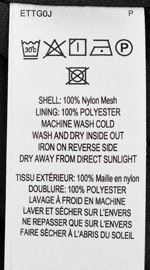 Fabric composition and care label — French Connection Blackout Camille Embroidered Shirt – Size M.