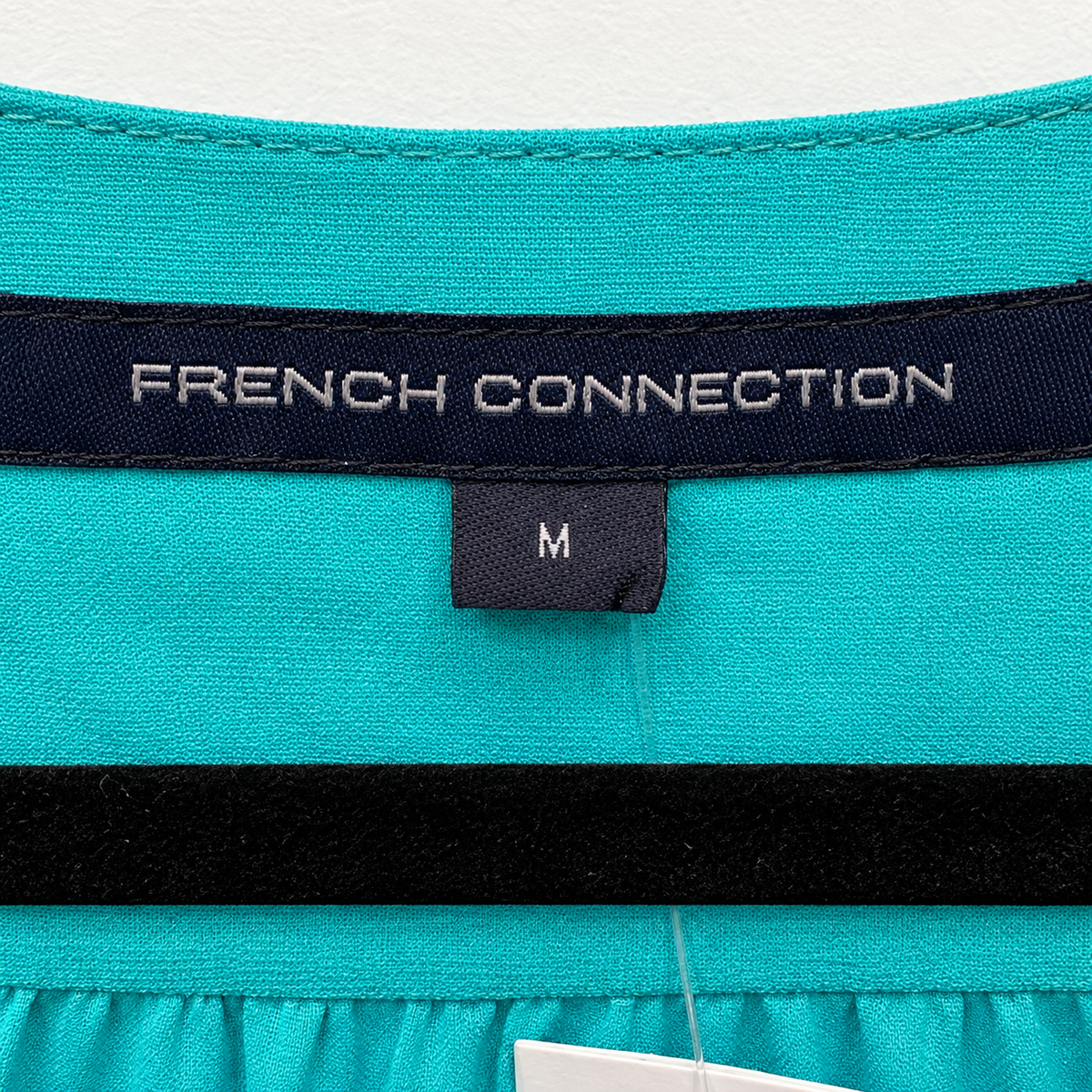 Brand and size label — French Connection Turquoise V-Neck Puff Sleeve Top – M.