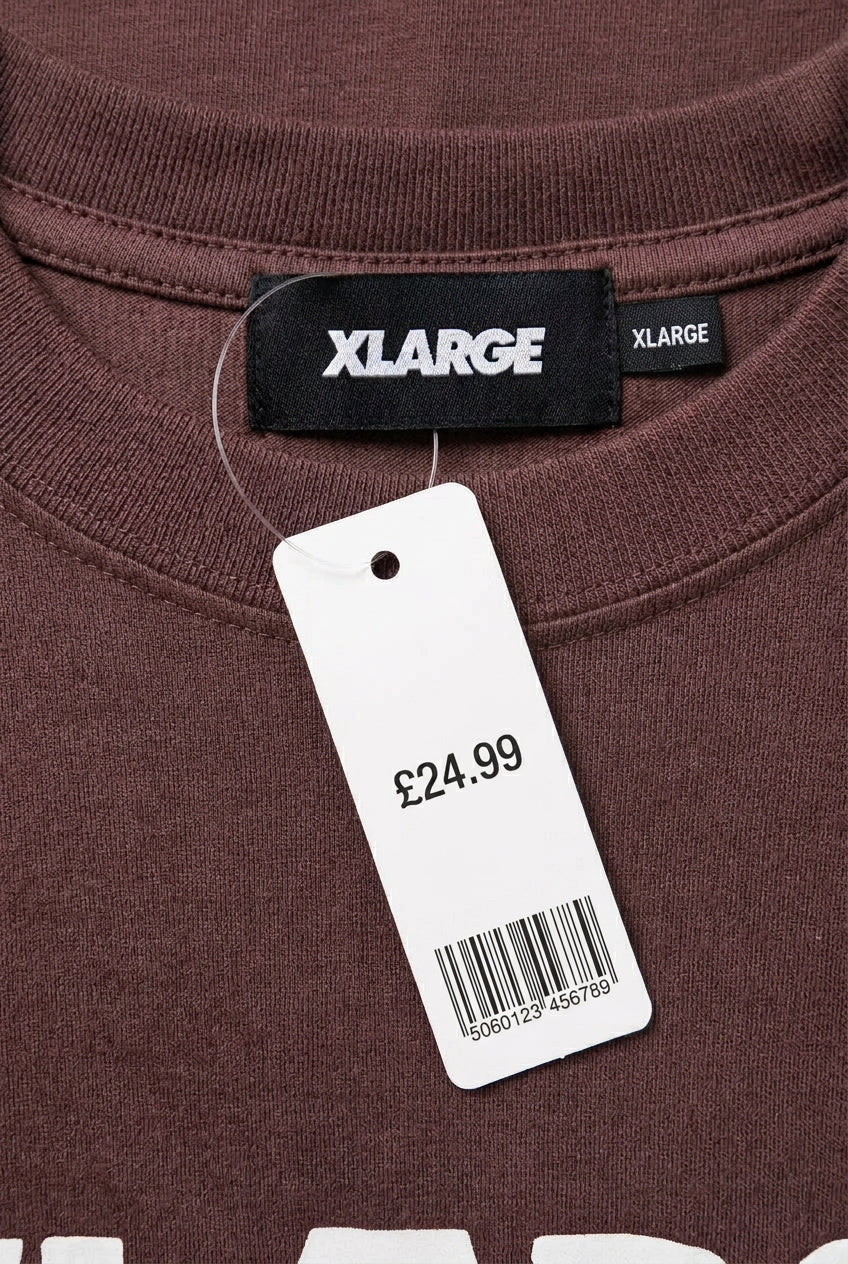 Brand and size label — XLARGE Brown Graphic T-Shirt – L / M.