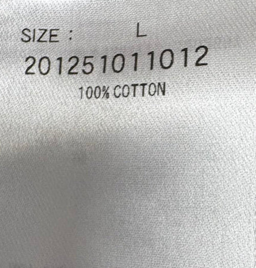 Fabric composition and care label — XLARGE Brown Graphic T-Shirt – L / M.