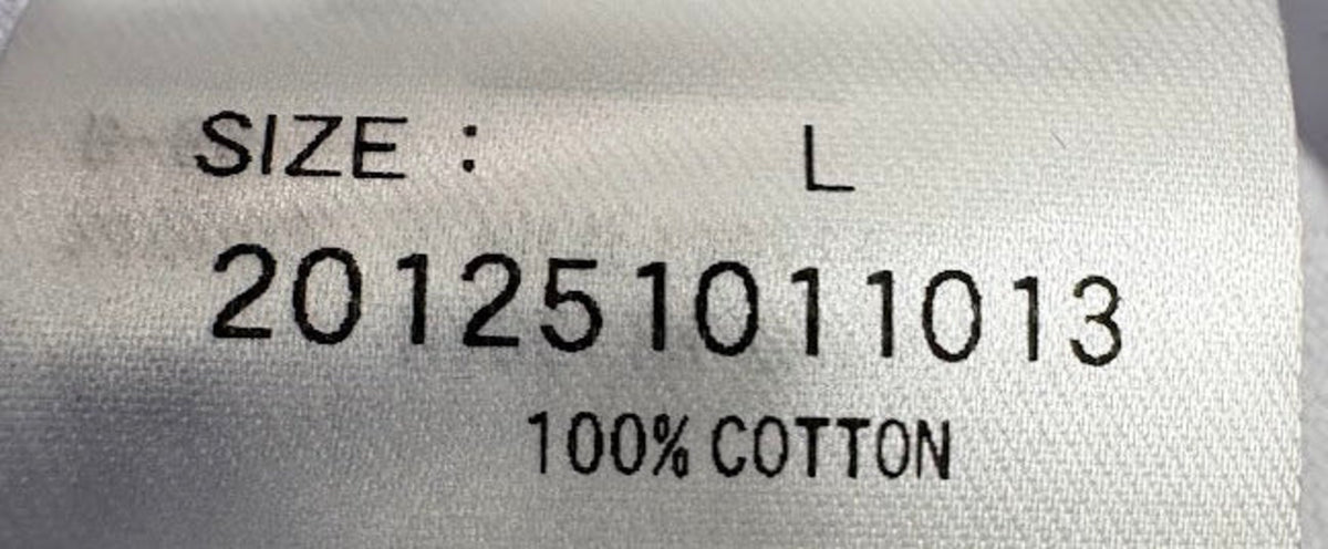 Fabric composition and care label — XLARGE White Graphic T-Shirt - L.