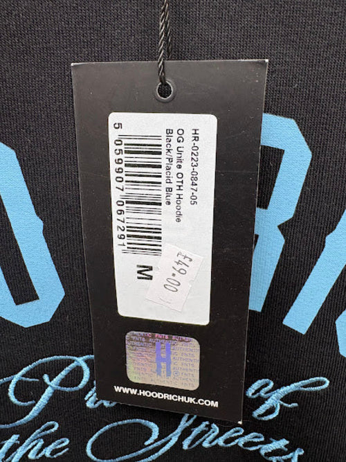 Retail tag showing style and size — Hoodrich Black/Placid Blue OG Unite OTH Hoodie – M.
