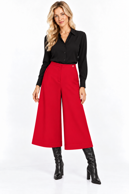 Twinset red calf-length wide-leg trousers with black blouse and boots