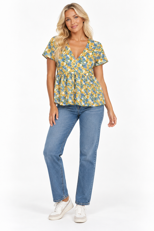 In The Style x Stacey Solomon Blue & Yellow Floral Smock Top – UK 12 shown on a model.