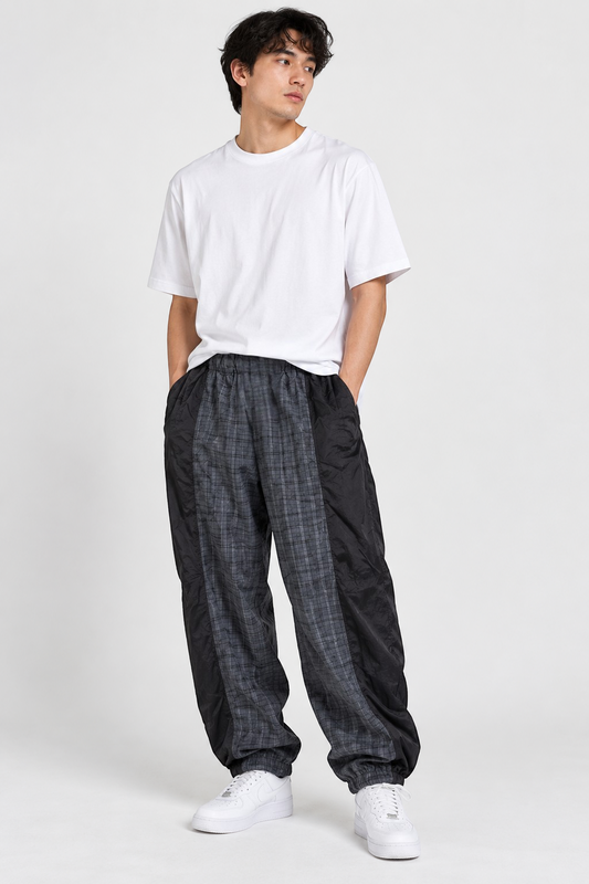 XLARGE Black/Grey Check Truck Pants – M shown on a model.