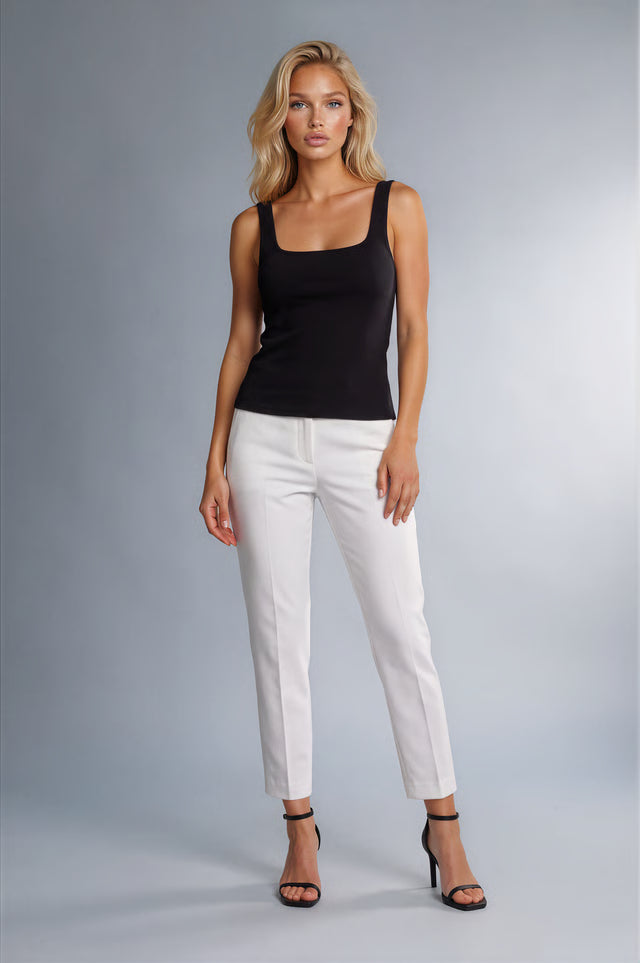Dsquared2 White Cool Girl Cropped Trousers – IT 42 shown on a model.